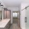 Double sink vanity with glass shower inside The Tomlin apartments