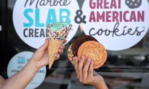 people holding ice cream and cookies