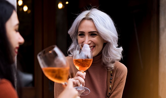 Friends enjoying a glass of wine 