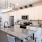 Open kitchen and living room with plenty of natural light.
