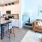 Open kitchen and living room with plenty of natural light.